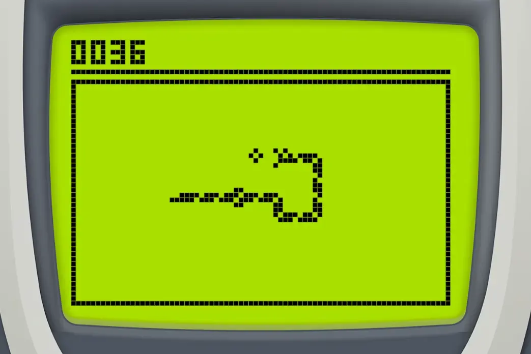 Nokia 6110 mostrando el juego Snake original en su pantalla monocromática